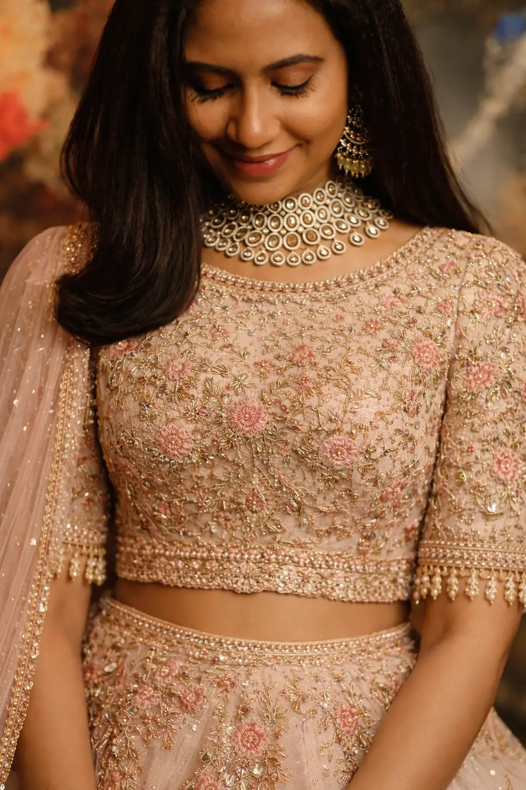 Scoop neck bridal blouse in raw silk with kundan embroidery, pairs with heavy lehengas.